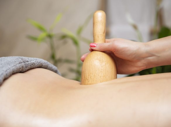 Maderotherapy massage with wooden swedish cup