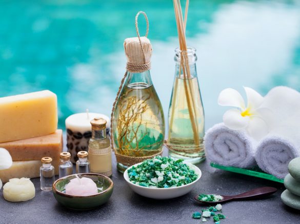 Spa and Wellness Massage Setting. Still Life with Essential Oil, Salt and Stones.